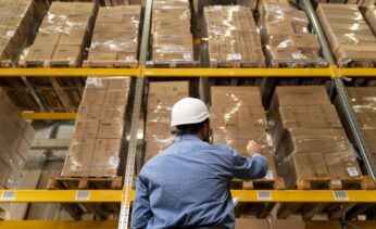 man-with-helmet-working-warehouse